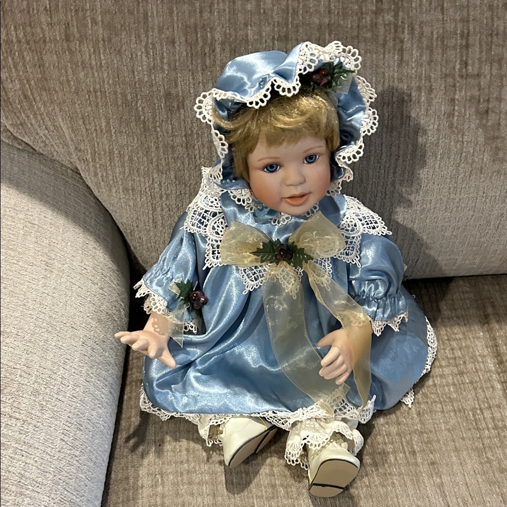 The Hamilton collection Kristen porcelain doll, dressed in beautiful blue